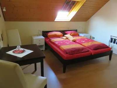 Ein Bett oder Betten in einem Zimmer der Unterkunft Ferienwohnungen Haus Albert