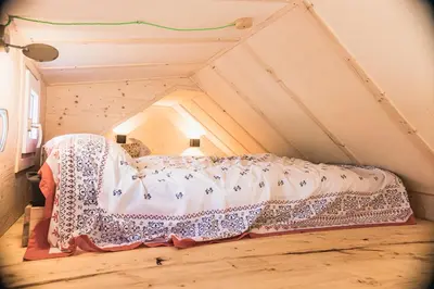 Ein Bett oder Betten in einem Zimmer der Unterkunft Tiny-Haus im Südhessischen Ried