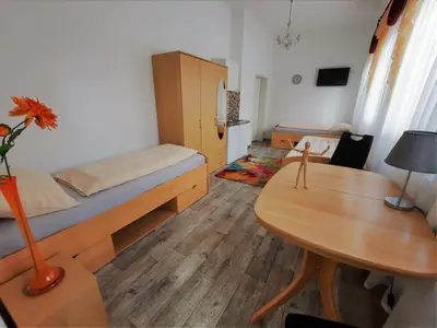 Ein Bett oder Betten in einem Zimmer der Unterkunft Pension Bei Valentina