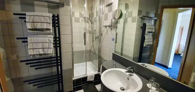 Ein Badezimmer in der Unterkunft Hotel Ifen