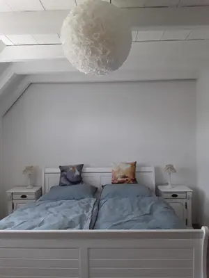 Ein Bett oder Betten in einem Zimmer der Unterkunft Willkommen in unserem kleinen Paradies