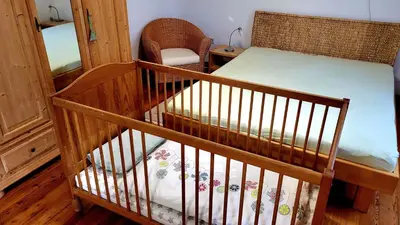 Ein Bett oder Betten in einem Zimmer der Unterkunft Ferienwohnung am Bruchwald