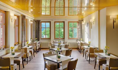 Ein Restaurant oder anderes Speiselokal in der Unterkunft Pfalzhotel Asselheim