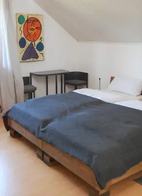 Ein Bett oder Betten in einem Zimmer der Unterkunft Gartenhaus am Weinberg