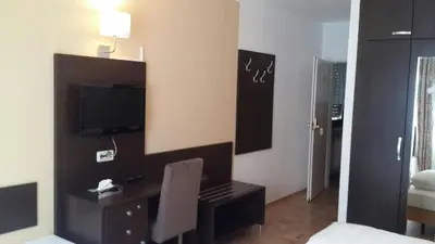 Ein Bett oder Betten in einem Zimmer der Unterkunft Hotel Starkenburger Hof