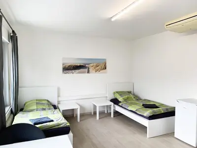 Ein Bett oder Betten in einem Zimmer der Unterkunft My-Skypalace Bad-Friedrichshall