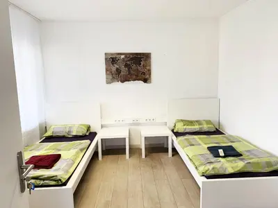 Ein Bett oder Betten in einem Zimmer der Unterkunft My-Skypalace Bad-Friedrichshall