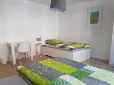 Ein Bett oder Betten in einem Zimmer der Unterkunft Ferienwohnung