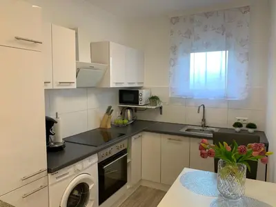 Küche/Küchenzeile in der Unterkunft Prime Host Charme Apartment