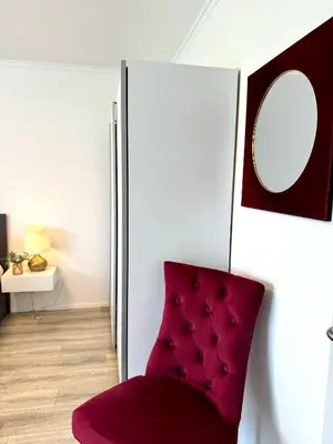 Ein Sitzbereich in der Unterkunft Prime Host Charme Apartment