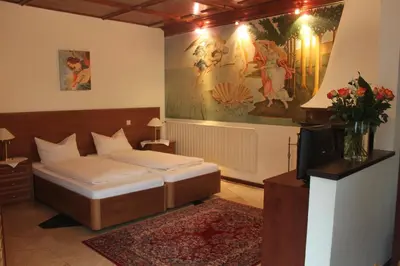 Ein Bett oder Betten in einem Zimmer der Unterkunft Hotel Restaurant Da Franco
