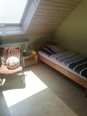 Ein Bett oder Betten in einem Zimmer der Unterkunft Anna - neue Ferienwohnung mit Blick ins Grüne