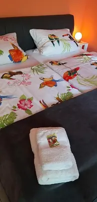 Ein Bett oder Betten in einem Zimmer der Unterkunft Ferienwohnung Am Backhausgarten