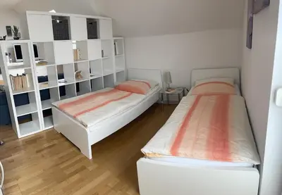 Ein Bett oder Betten in einem Zimmer der Unterkunft Ferienwohnung „Anhaide“