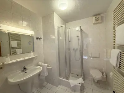 Ein Badezimmer in der Unterkunft Hotel Stiftswingert