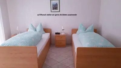 Ein Bett oder Betten in einem Zimmer der Unterkunft Haus am Fürstenweg
