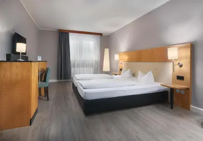 Ein Bett oder Betten in einem Zimmer der Unterkunft Trip Inn Hotel Egelsbach Frankfurt