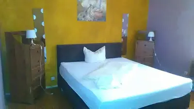 Ein Bett oder Betten in einem Zimmer der Unterkunft WOHNUNG IN KAISERSLAUTERN