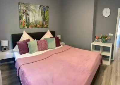 Ein Bett oder Betten in einem Zimmer der Unterkunft Family Apartment