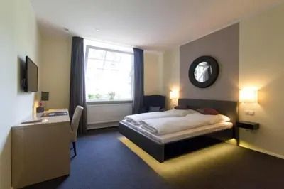 Ein Bett oder Betten in einem Zimmer der Unterkunft Die Villa