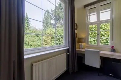 Ein Badezimmer in der Unterkunft Die Villa
