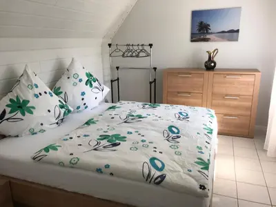 Ein Bett oder Betten in einem Zimmer der Unterkunft Ferienwohnung Bernhard