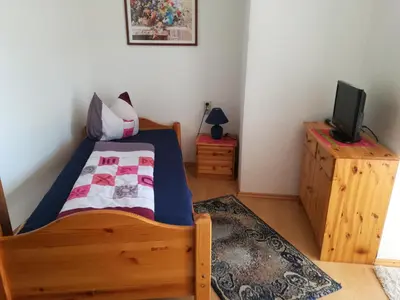 Ein Bett oder Betten in einem Zimmer der Unterkunft Brauhaus Fröschl