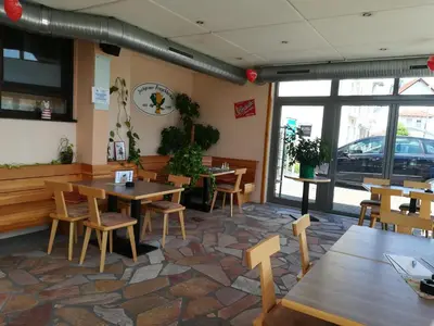 Ein Restaurant oder anderes Speiselokal in der Unterkunft Brauhaus Fröschl