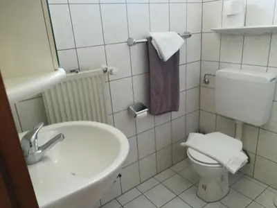 Ein Badezimmer in der Unterkunft Brauhaus Fröschl