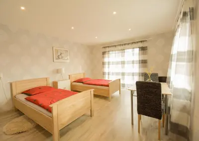 Ein Sitzbereich in der Unterkunft Mainzimmer - Business Apartments