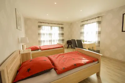 Ein Bett oder Betten in einem Zimmer der Unterkunft Mainzimmer - Business Apartments