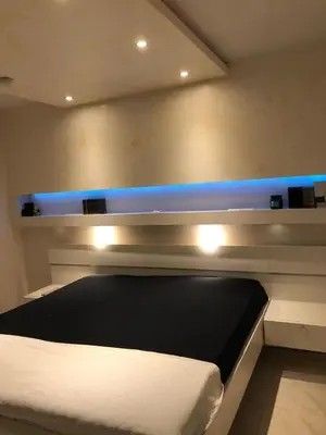 Ein Bett oder Betten in einem Zimmer der Unterkunft blau Wohnung