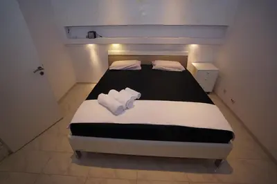 Ein Bett oder Betten in einem Zimmer der Unterkunft blau Wohnung