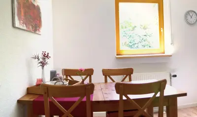 Ein Sitzbereich in der Unterkunft Ferienwohnung Am Wingert