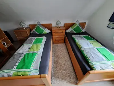 Ein Bett oder Betten in einem Zimmer der Unterkunft Ferienwohnung galina