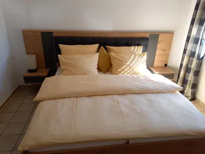 Ein Bett oder Betten in einem Zimmer der Unterkunft Hotel Lindenhof