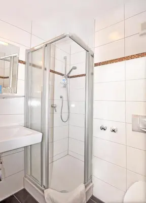 Ein Badezimmer in der Unterkunft Hotel Lindenhof