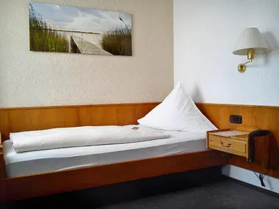 Ein Bett oder Betten in einem Zimmer der Unterkunft Hotel Burg Breuberg
