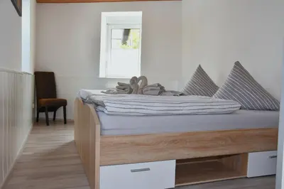 Ein Bett oder Betten in einem Zimmer der Unterkunft FeWo 1 - Deidesheim