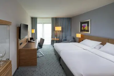 Ein Bett oder Betten in einem Zimmer der Unterkunft Maritim Hotel Darmstadt