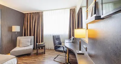Ein Sitzbereich in der Unterkunft PLAZA Premium Darmstadt