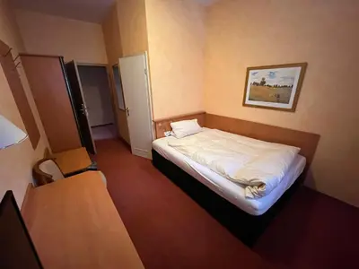Ein Bett oder Betten in einem Zimmer der Unterkunft Landhotel Ritter-Post