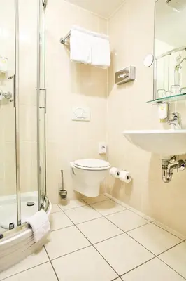 Ein Badezimmer in der Unterkunft Parkhotel Krone