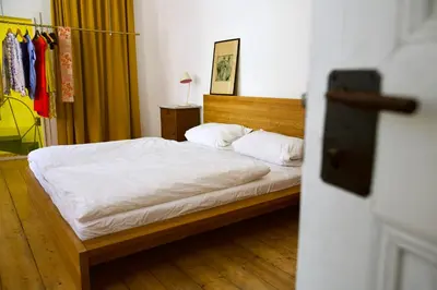 Ein Bett oder Betten in einem Zimmer der Unterkunft Boutique-Ferienwohnung im alten Weinhaus Moser