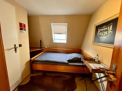 Ein Bett oder Betten in einem Zimmer der Unterkunft PUB 111 - Die Altstadt Unterkunft