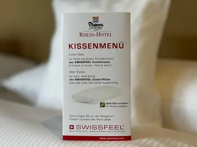 Ein Bett oder Betten in einem Zimmer der Unterkunft Rhein-Hotel Nierstein