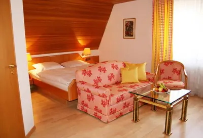 Ein Bett oder Betten in einem Zimmer der Unterkunft Pension Rose