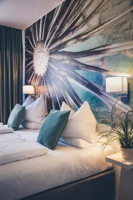 Ein Bett oder Betten in einem Zimmer der Unterkunft Gartenstadt Hotel