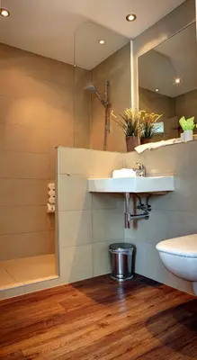 Ein Badezimmer in der Unterkunft Gartenstadt Hotel