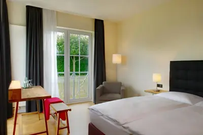 Ein Bett oder Betten in einem Zimmer der Unterkunft Hotel Zielonka